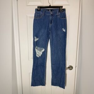Hollister NWT low rise dad jeans with raw hem in medium wash. Size 0